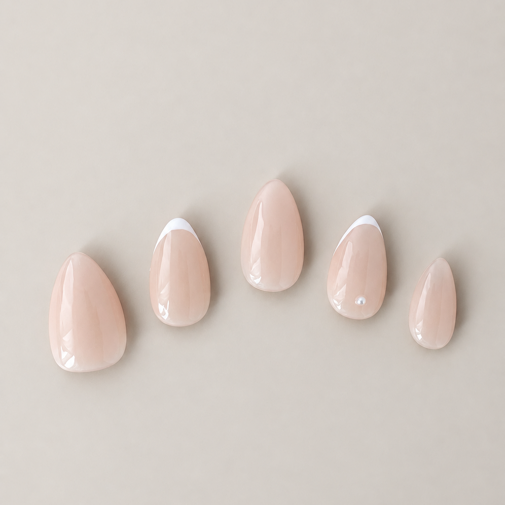 French Trace press-on nail set with delicate micro-French tips and pearl detail