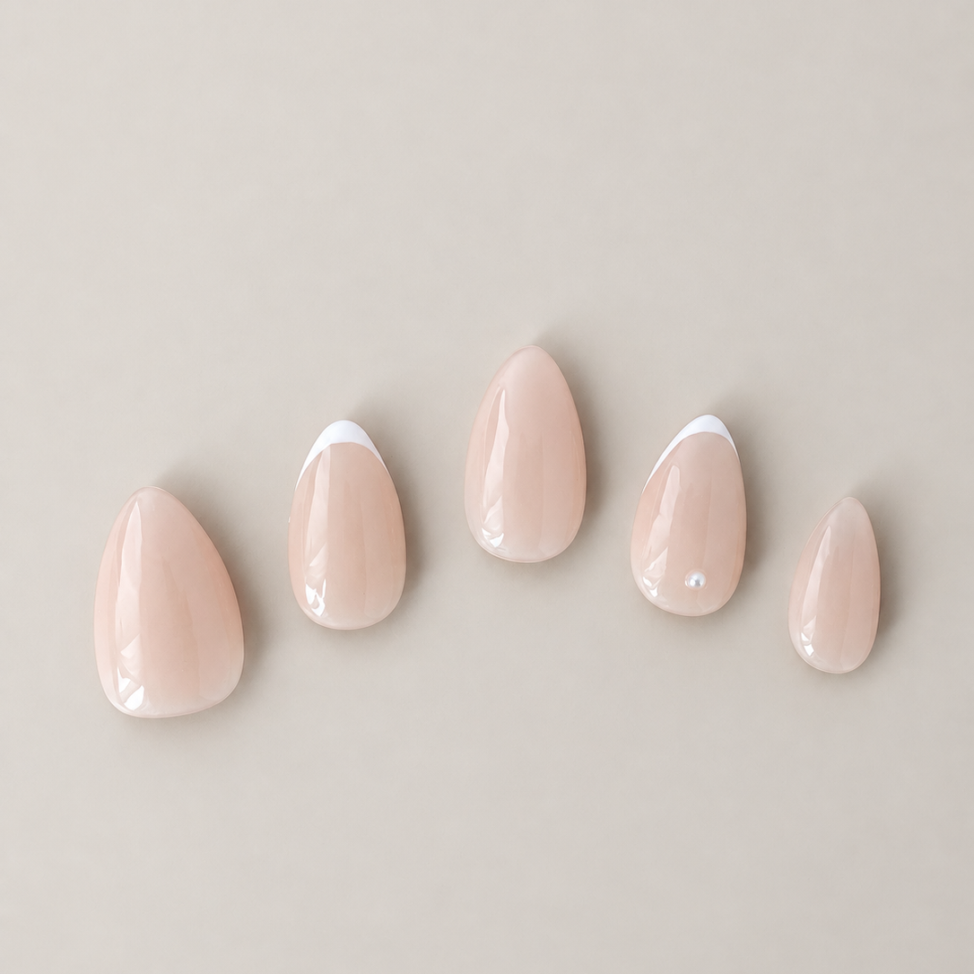 French Trace press-on nail set with delicate micro-French tips and pearl detail