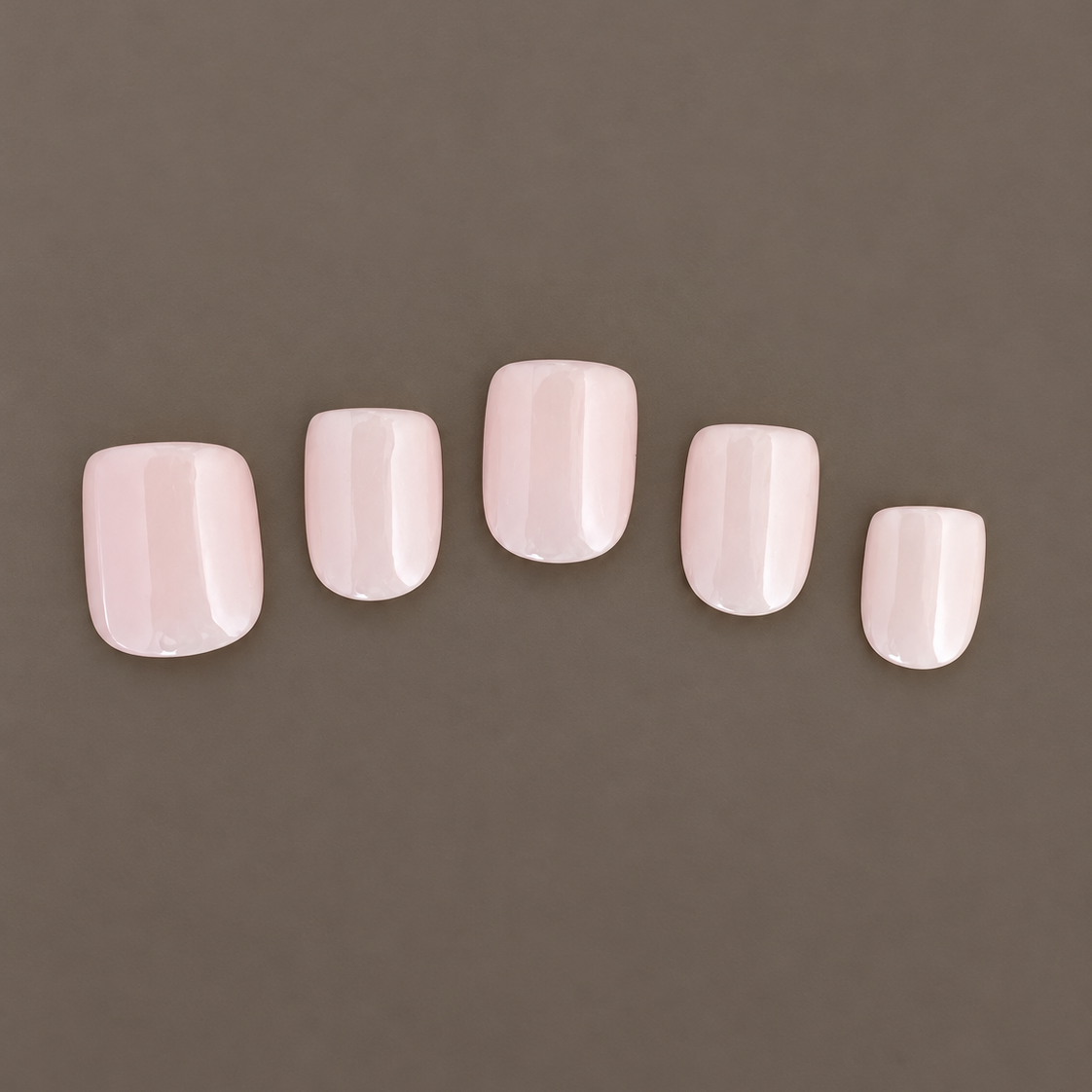 Extra-short soft pink nude press-on nails in Extra Cameo by U.P.O.N
