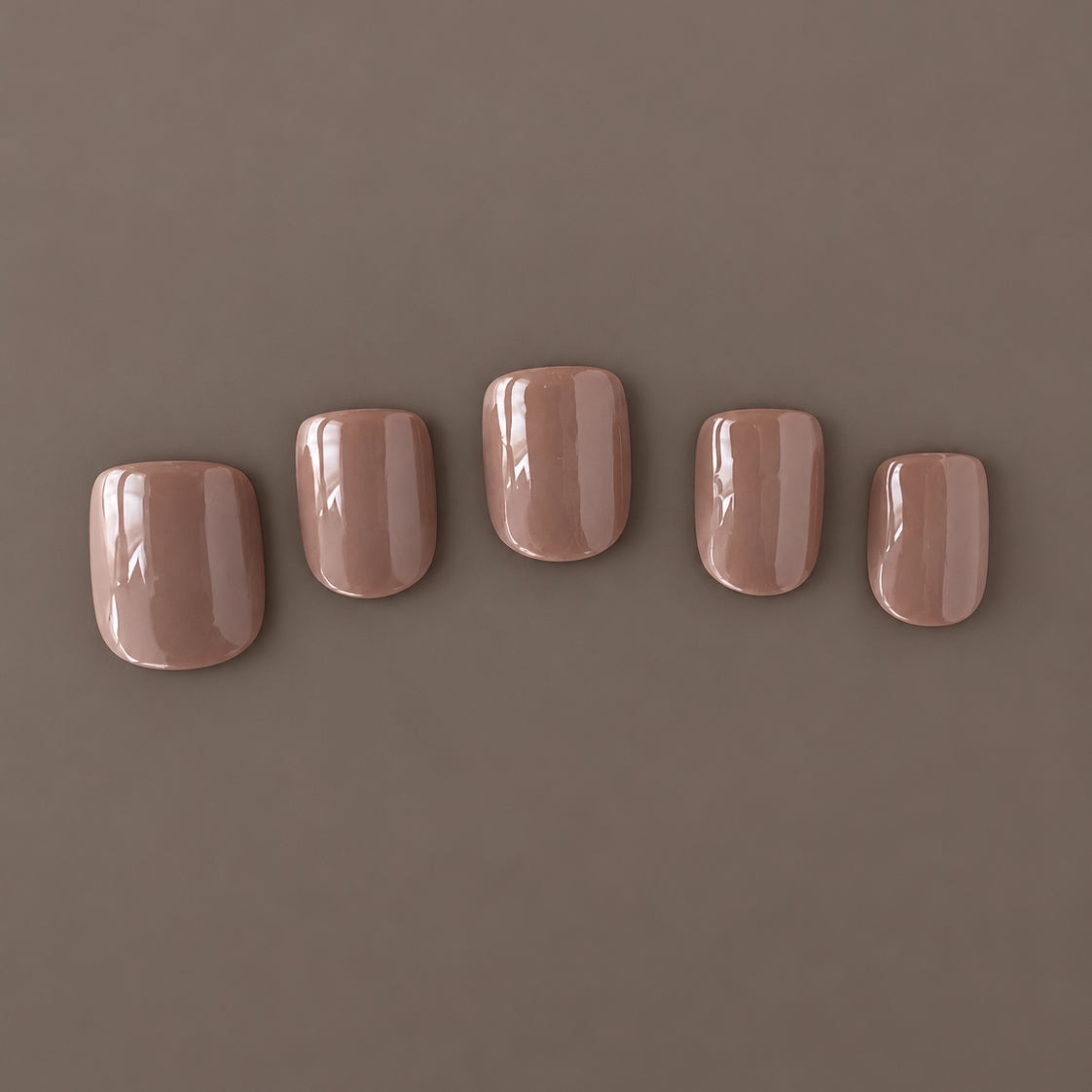 Extra-short taupe press-on nails in Extra Taupe by U.P.O.N